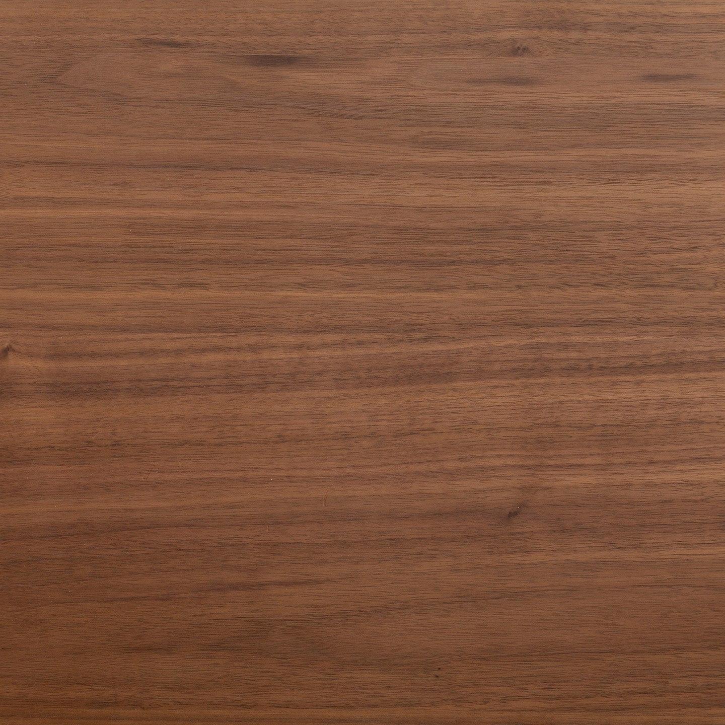 Expertly crafted in Germany, the Tischplatte - Furnier Walnuss features a smooth, medium-brown surface with subtle horizontal grain patterns and natural texture variations.