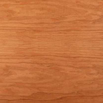 The Tischplatte - Furnier Kirsche features a light brown surface with subtle, natural grain patterns running horizontally. Its smooth texture provides a warm, uniform look—expertly crafted and made in Germany.