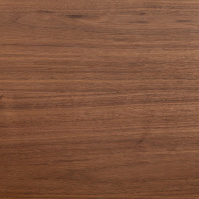 Expertly crafted in Germany, the Tischplatte - Furnier Walnuss features a smooth, medium-brown surface with subtle horizontal grain patterns and natural texture variations.