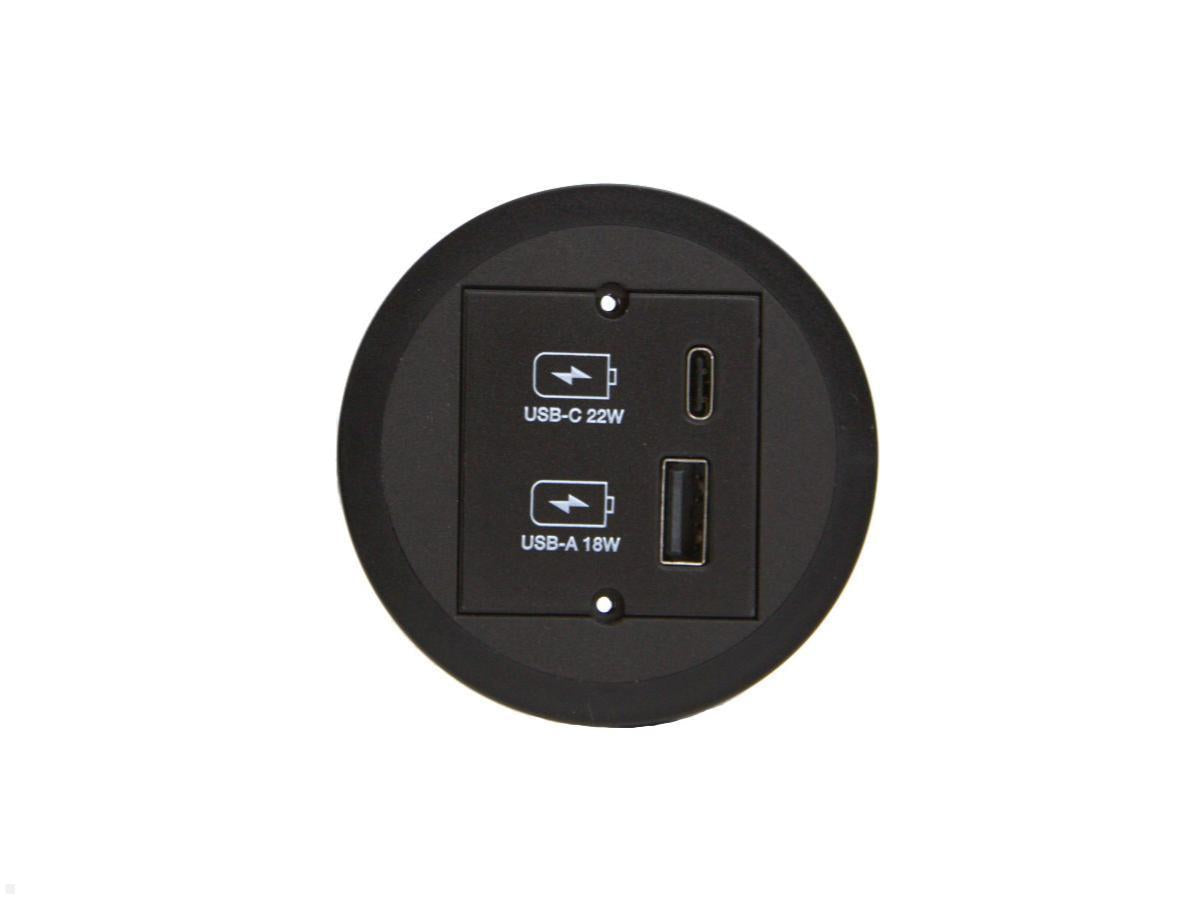 A round black Kombicharger USB A/C wall socket with integrated charging, featuring labeled USB-C 22W and USB-A 16W ports, shown against a white background.