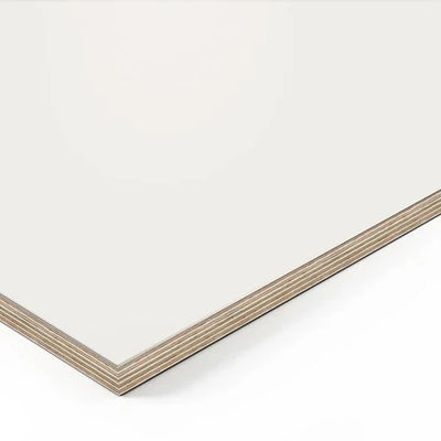 A close-up of the Tischplatte - Multiplex Fenix Bianco shows its smooth white matte surface and distinct layered wooden edges.